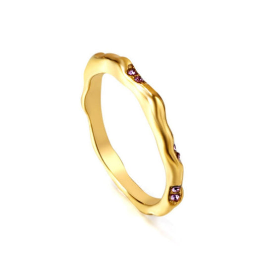 Gold ring with purple stones